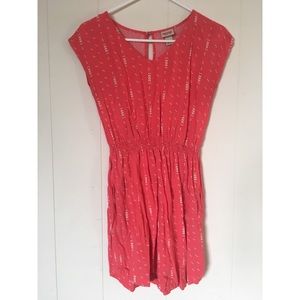Cute short coral colored print dress with pockets